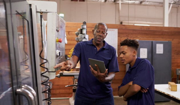 16-engineer-training-young-male-apprentice-on-cnc-mac-2024-10-22-05-45-16-utc 16-engineer-training-young-male-apprentice-on-cnc-mac-2024-10-22-05-45-16-utc